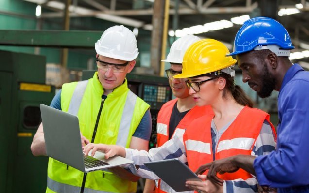 Diversity,Factory,Worker,Working,With,Computer,Laptop,In,Factory.,Male
